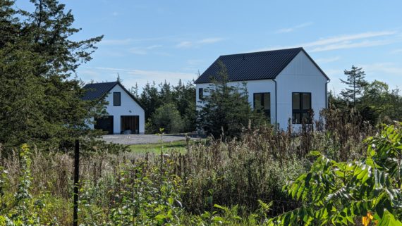 A lovely little modern barn style home & garage